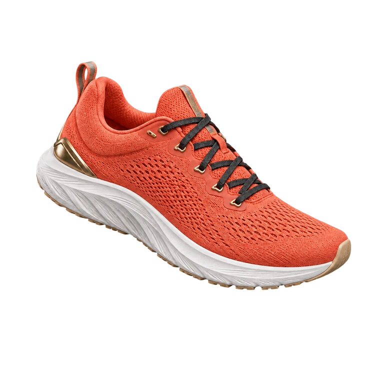 Transparent cutout: Complete coral sneaker isolated from a teal studio background with real transparency
