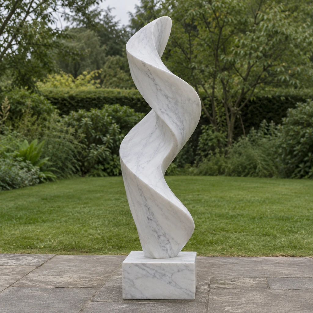 A white spiral sculpture with its base visible before the bloom effect