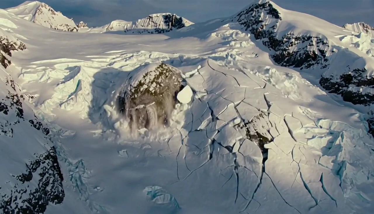 A giant rises among ice and mountains