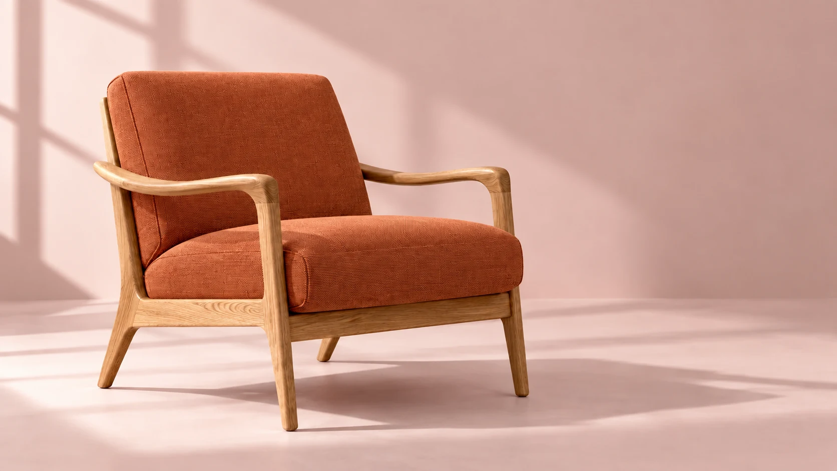 Same oak lounge chair with terracotta upholstery in the original rose studio